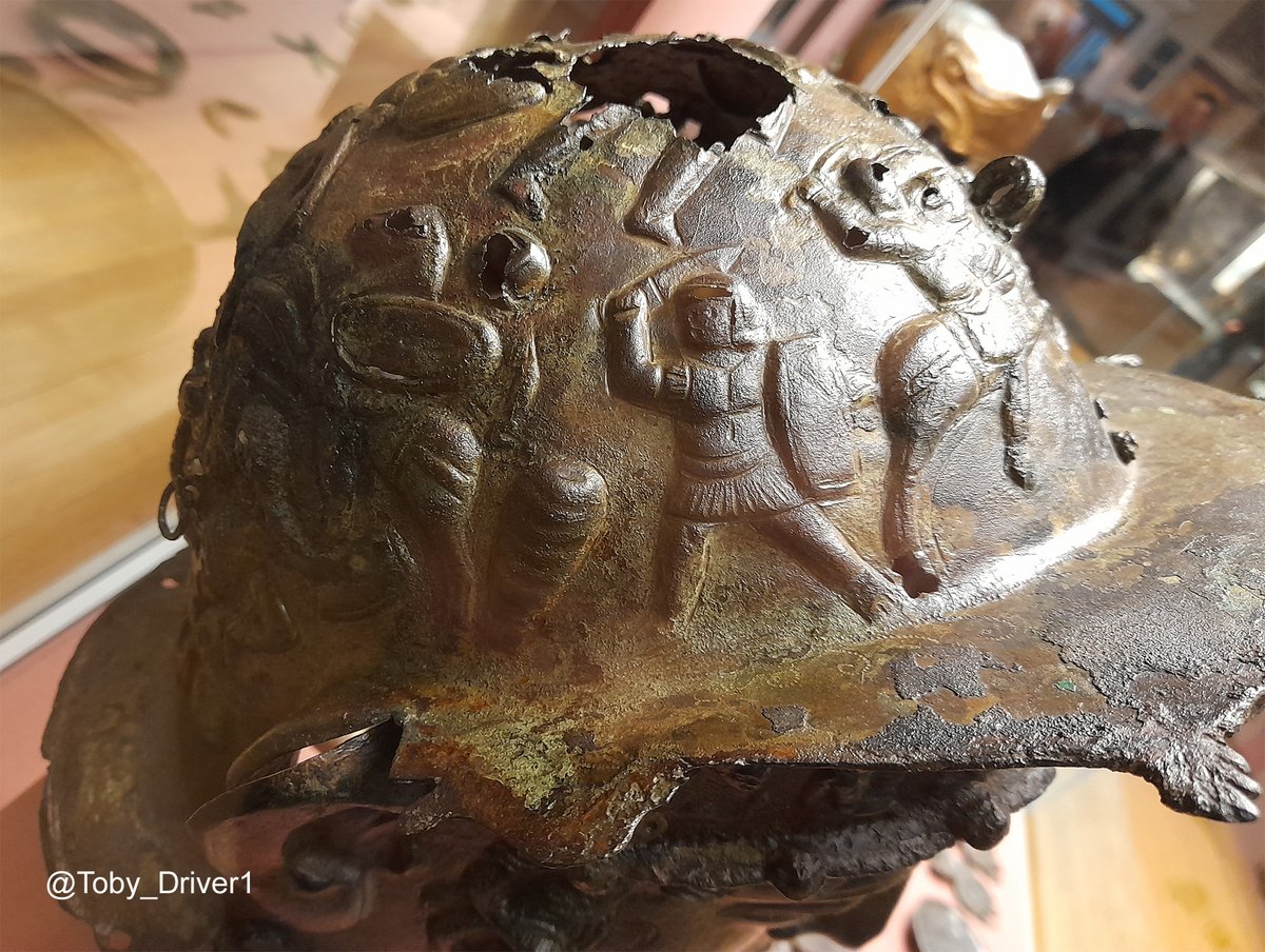 A vigorous scene of a skirmish between #Roman infantry &amp; cavalry adorns the top of the Ribchester helmet, originally worn by an elite cavalryman. It was discovered in 1796 by a clogmaker's son, with a hoard, &amp; is now on display in the British Museum.

👉britishmuseum.org/collection/obj…