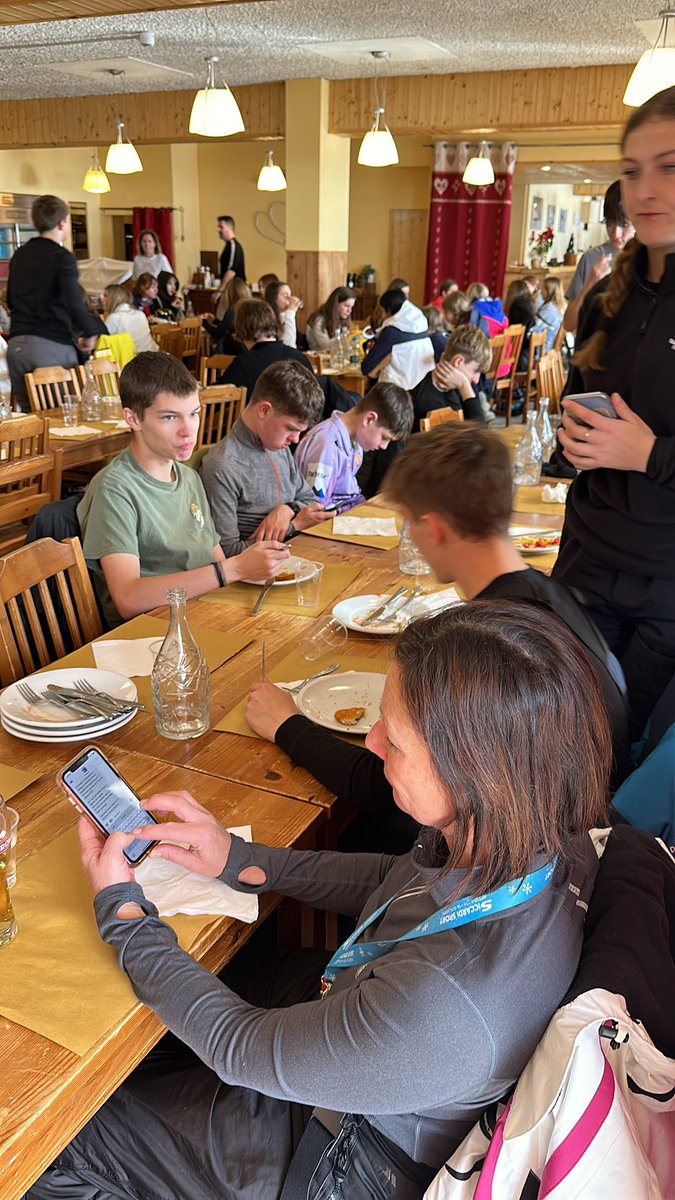 SVCSSkiTrip's tweet photo. Student just finishing lunch. Chips and a breaded meat product, wolfed down. As a group they are absolutely buzzing again today and can’t wait to get back up the mountain. #SVCSSkiTrip https://t.co/Rj0oeijFvl