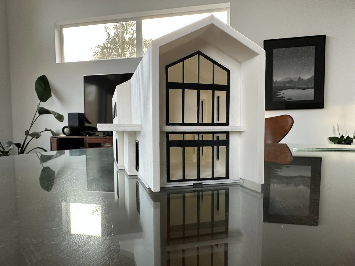 snapmaker's tweet image. This model looks awesome! Our user Ian Kennington designed and 3d-printed a 1:64 scale Scandinavian-style house model for his clients. This #architecturemodel consists of an exterior shell and two interior parts. It was designed in #SketchUp Pro and printed on Snapmaker 2.0.