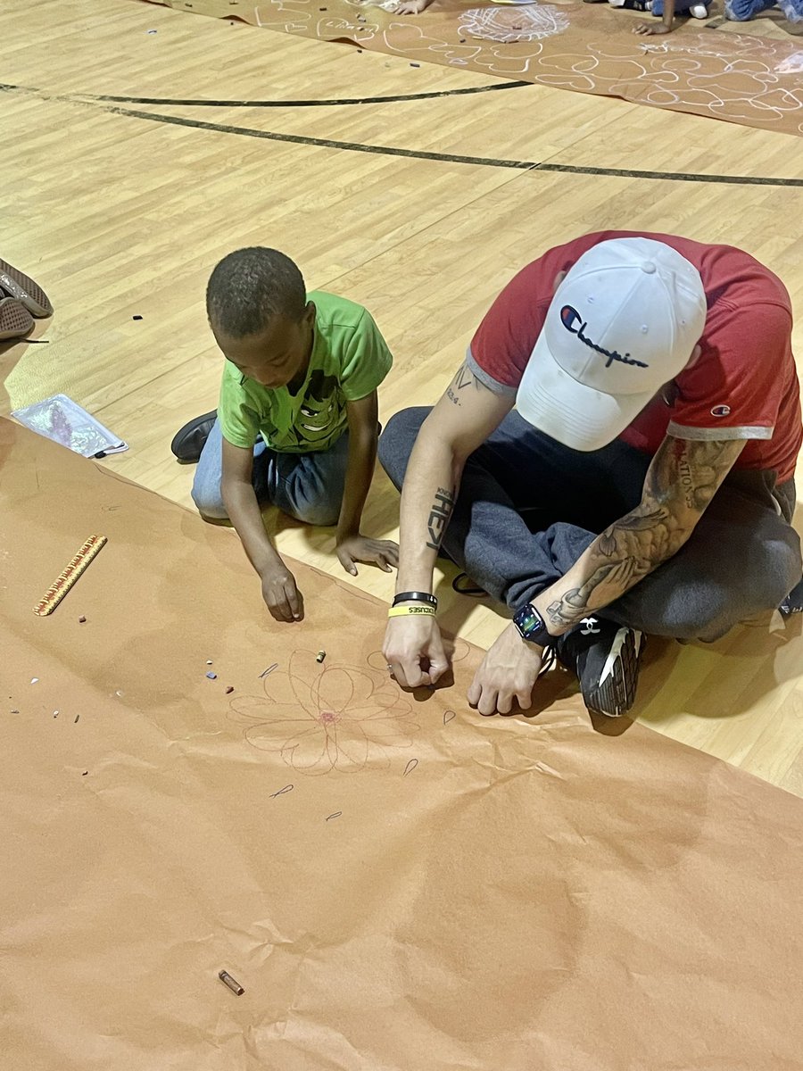 I'm not sure who is enjoying this coloring break more, Josh or Coach Jackson. #relationshipmatter #PBIS #everyjourneyhasagreatstory @Scurlockbears @MsRJones35