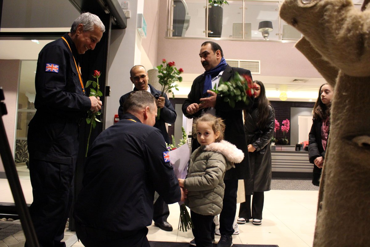 NFCC_FireChiefs's tweet photo. See the moment UKISAR team arrives home. The 77-strong team and 4 search dogs landed at Stansted airport to a salute from fire engines and a reception, including a representative from the Turkish consulate. @STN_Airport &amp; thanks to @ECFRS for capturing. https://t.co/jC15bCHLfv https://t.co/iYjaaXqSj4