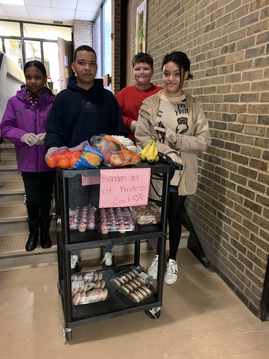Walton middle school Scholar-Leaders modeling Random Acts of Kindness with cards &amp; treats 💗