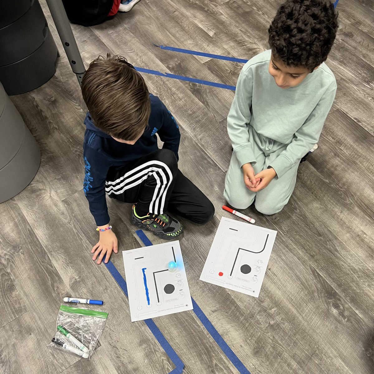 Second graders learning how to code with Ozobots, one of my favorite ...