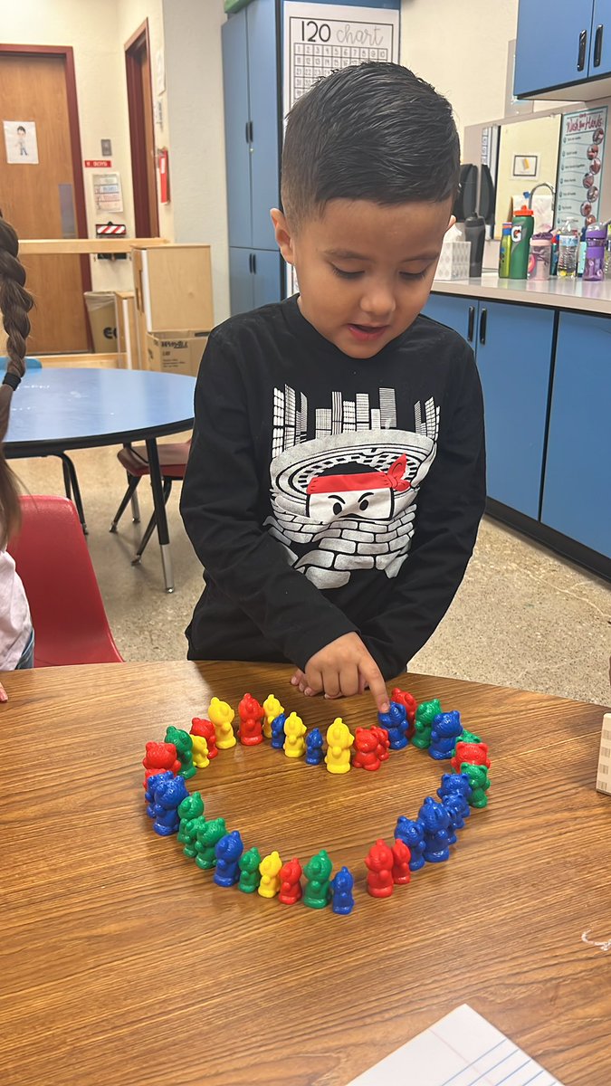 QuavonteR's tweet photo. Creative counting!  He made a heart and counted 40 bears with no help! #BuildingPease https://t.co/jiQz812jvb