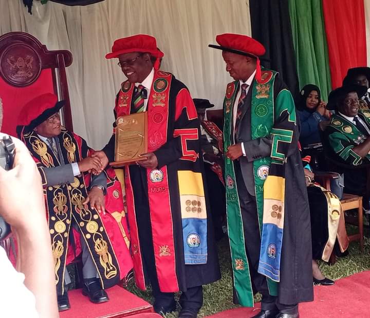 OfficialMubs's tweet photo. Prof. @jwbalunywa Principal MUBS was recognized for his outstanding performance and contribution to MUBS and Makerere University as a whole. This award was given to him by Makerere University Convocation during the 4th session of #Mak73rdGrad. https://t.co/m5zW7hJwhb