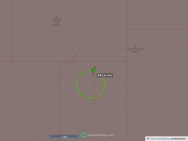 Aircraft with unknown registration, hex/ICAO fffff0 call sign ARC6164 is circling over Nye County at 9700 feet, speed 54 MPH, 0.7 miles from Mine Mountain Junction globe.adsbexchange.com/?icao=fffff0&z…