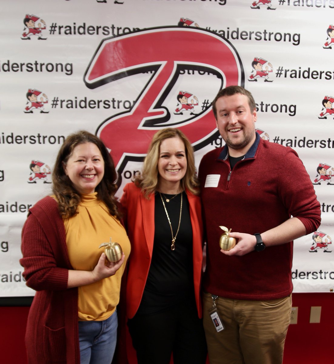 pcsd's tweet photo. Congrats to PCMS teacher Sarah Morgan, left, and PHS teacher Derek Zahn, right, who received Greater Green Bay Chamber's Golden Apple Awards in front of PCSD staff assembled for Professional Development  Day today. They are shown with superintendent Allison Space. #RaiderStrong https://t.co/wiLfyvkQ0L