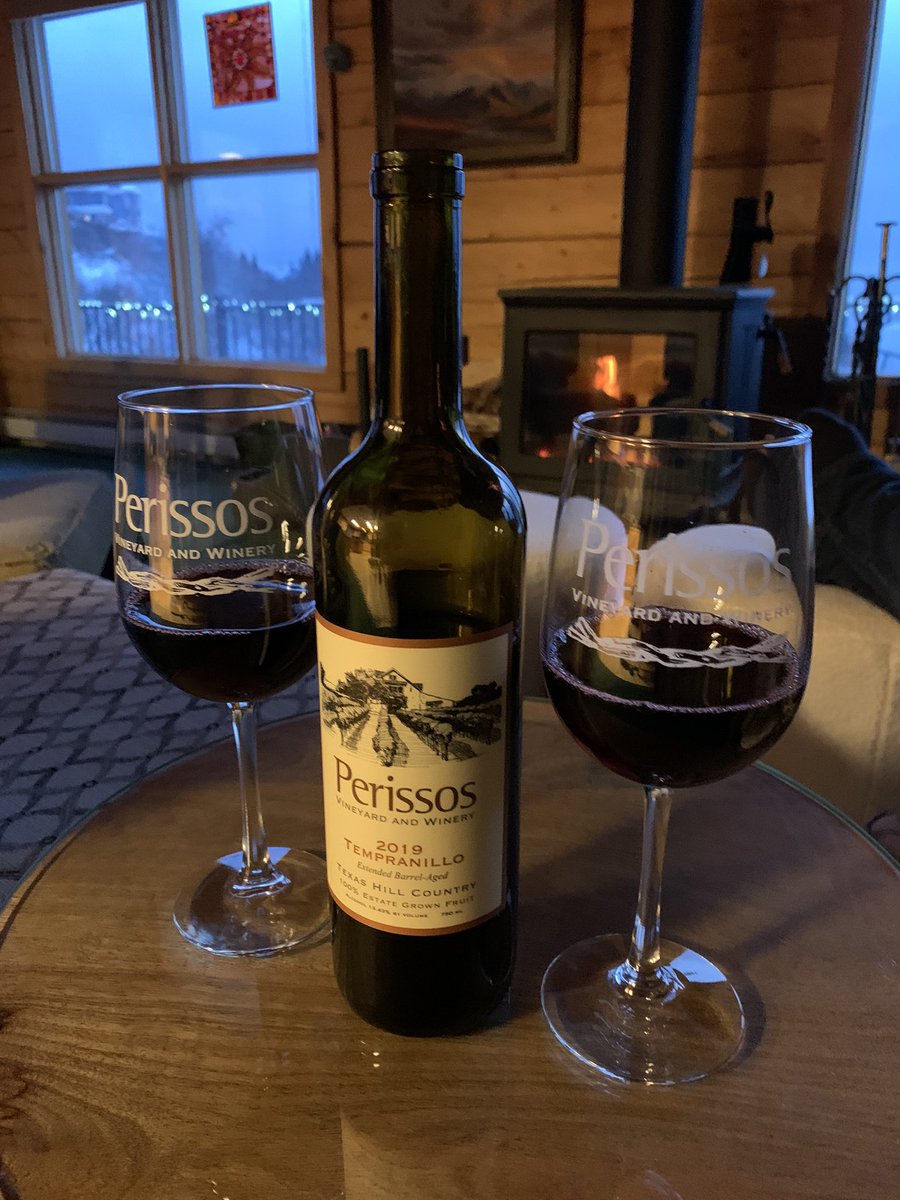 Enjoying a delicious Tempranillo by the wood-burning stove on a cold Alaskan winter night thanks to our latest Perissos Vineyard & Winery club shipment. #wines #relaxing #homefires #texashillcountrywines