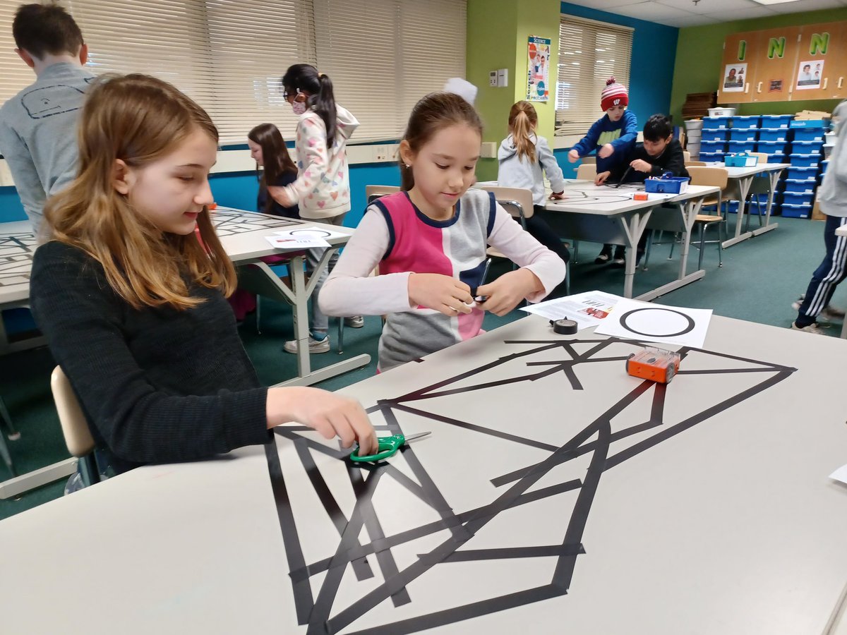21longfellow's tweet photo. 4th graders are learning about robotics with our new Edison robots. In these pictures they are experimenting with creating lines for Edison to follow after scanning a barcode. There has been a lot of great collaboration and critical thinking already! #21Learns https://t.co/Q3G49jWG6Y