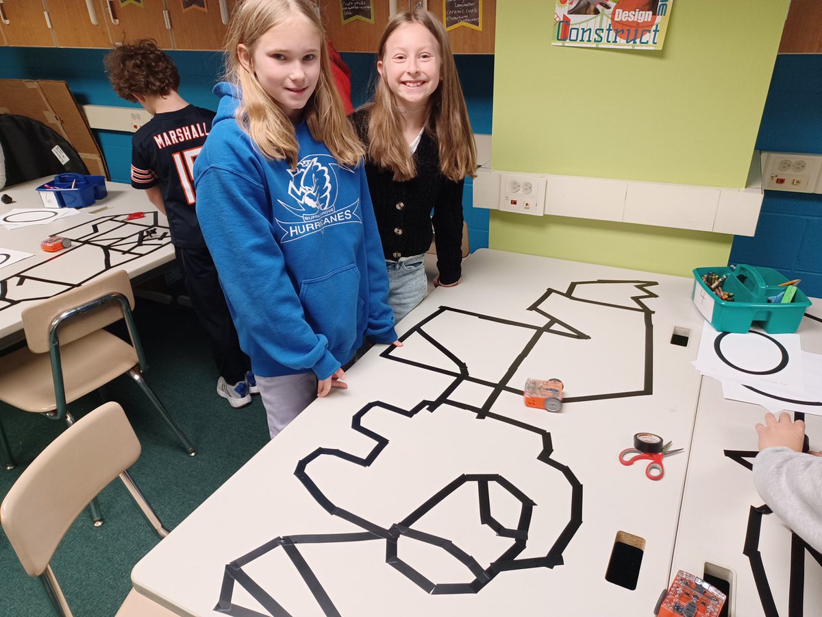 21longfellow's tweet photo. 4th graders are learning about robotics with our new Edison robots. In these pictures they are experimenting with creating lines for Edison to follow after scanning a barcode. There has been a lot of great collaboration and critical thinking already! #21Learns https://t.co/Q3G49jWG6Y