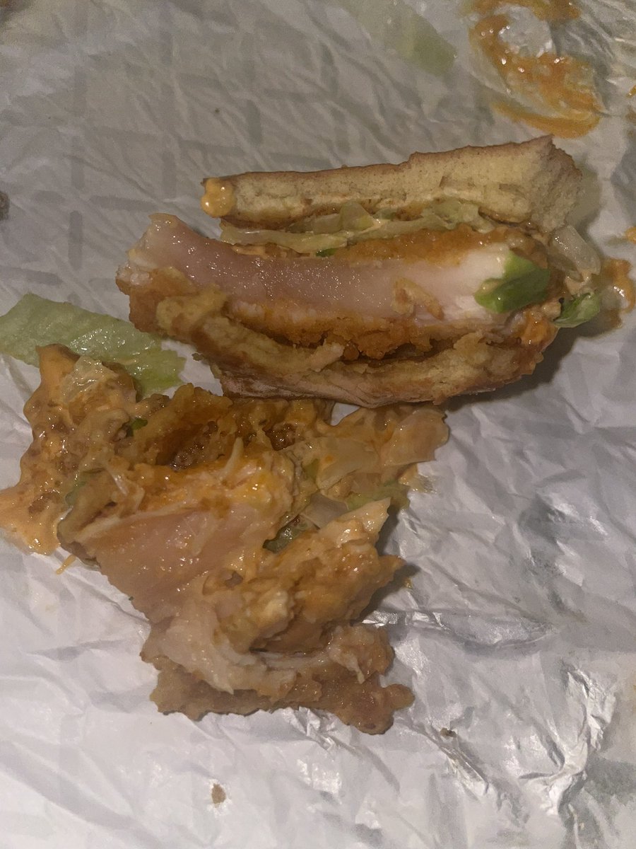 flambebae's tweet photo. RAW chicken sandwich from @kfc in Bells Corners. Unacceptable and disgusting. https://t.co/SKDN8aVq9r