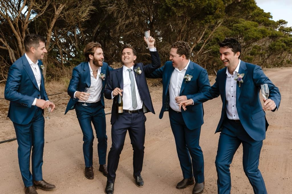 Beg_YourPardon's tweet photo. This picture speaks volumes about this tight-knit group of gents. Sam, I hope you and Bridget had a memorable day. Thank you for the honor of having me make your wedding suits. https://t.co/Os4exyNuvy