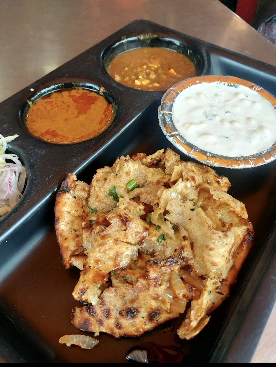 Radheshyam Chole Bhature. Chole is mildly spicy and has a thick gravy