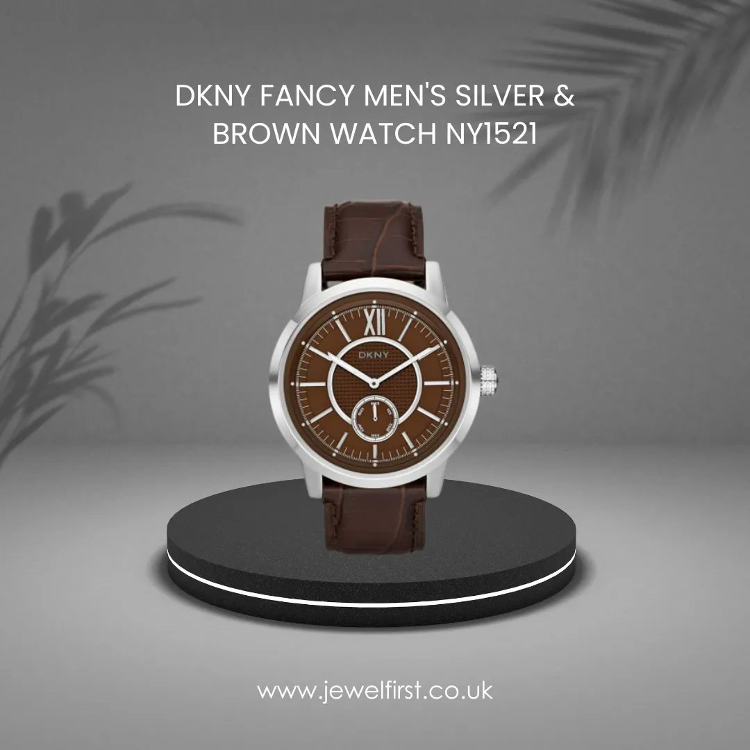 JewelFirst's tweet photo. This stylish men's DKNY watch features a stainless steel case with brown dial and a genuine brown leather strap with traditional buckle fastening. This watch is powered by a quartz movement.  

https://t.co/K1CKf3jito https://t.co/eUUXIQwxCC