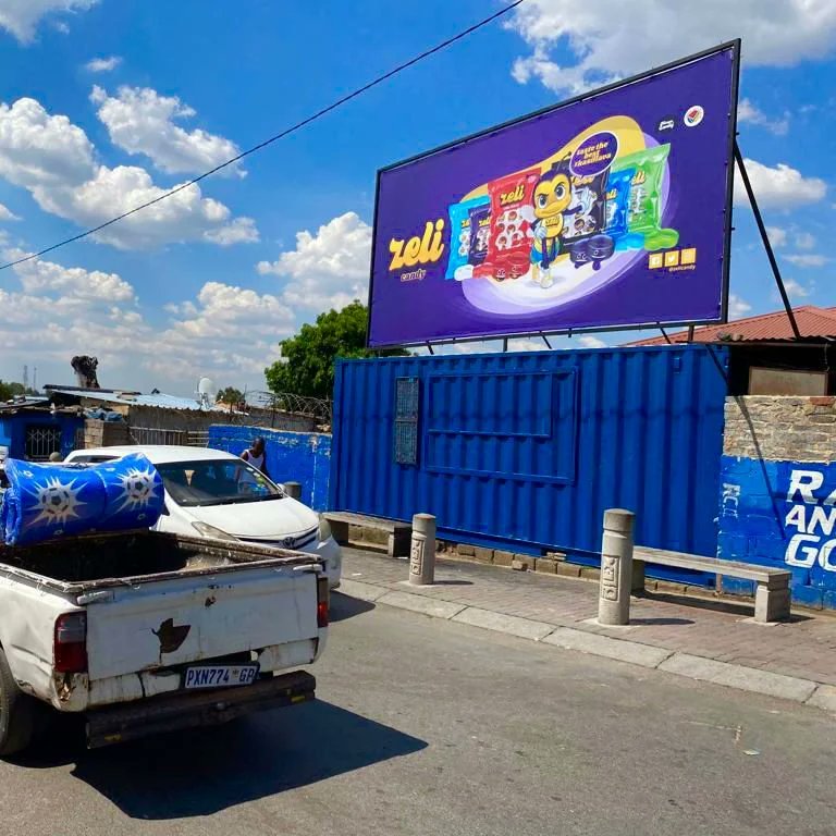 zeli_candy's tweet photo. Our #zelicandy billboard in Alex !  #zelisweets🇿🇦 🌶️🔥#chillicherry 👅💙#blackberry 🍬 #zelicandy https://t.co/Y8sgm4Cll0