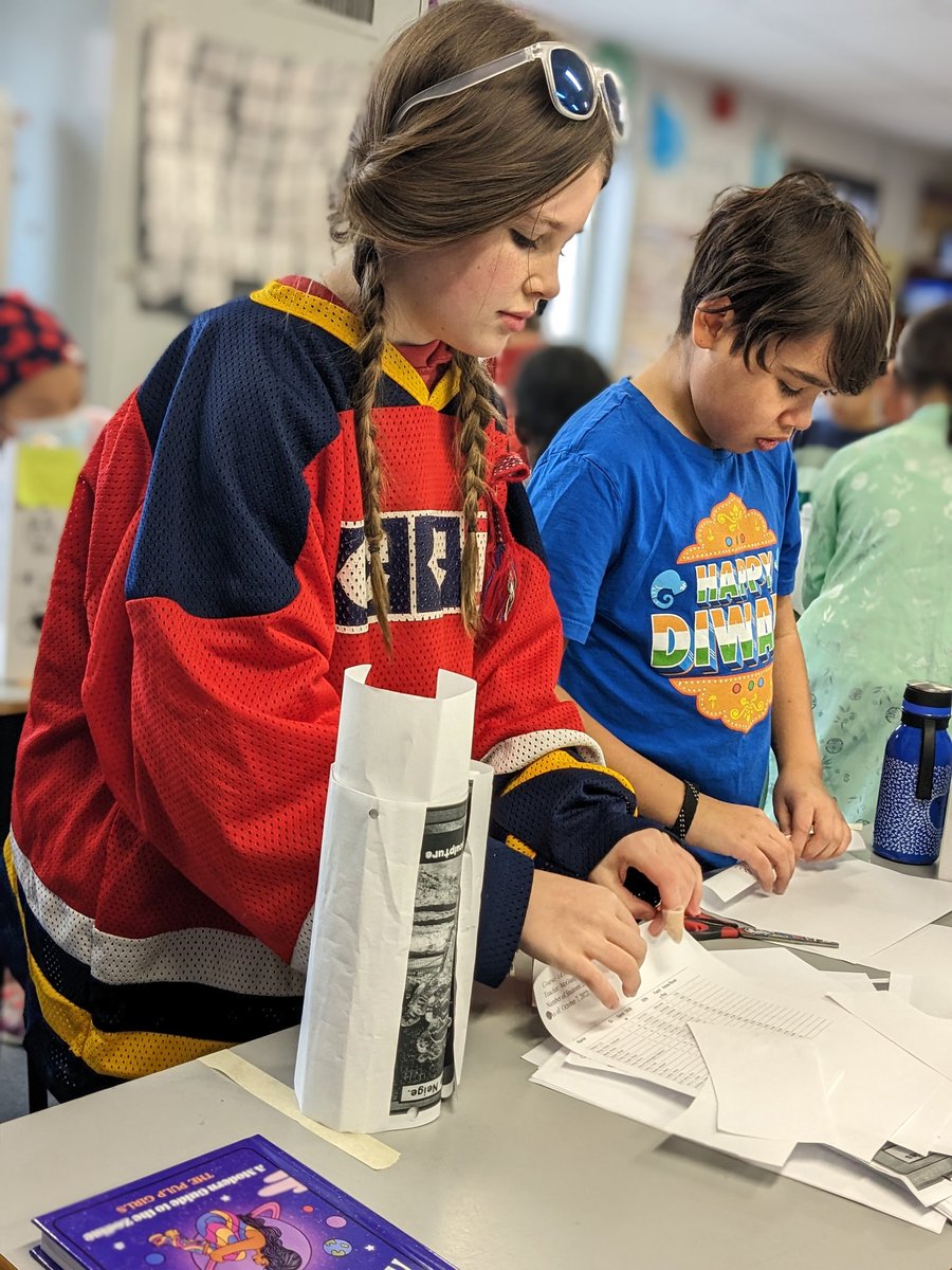 Défi papier! Les 5e ont conçu une structure avec un mètre du ruban adhésif et papier. Défi #1 soutenir un agrafeuse. Défi #2 un perforateur. Exemplary perseverance and problem solving to hold that hole puncher! They thought about stability and form in their designs. <a href="/AngelsOCSB/">Guardian Angels School</a>