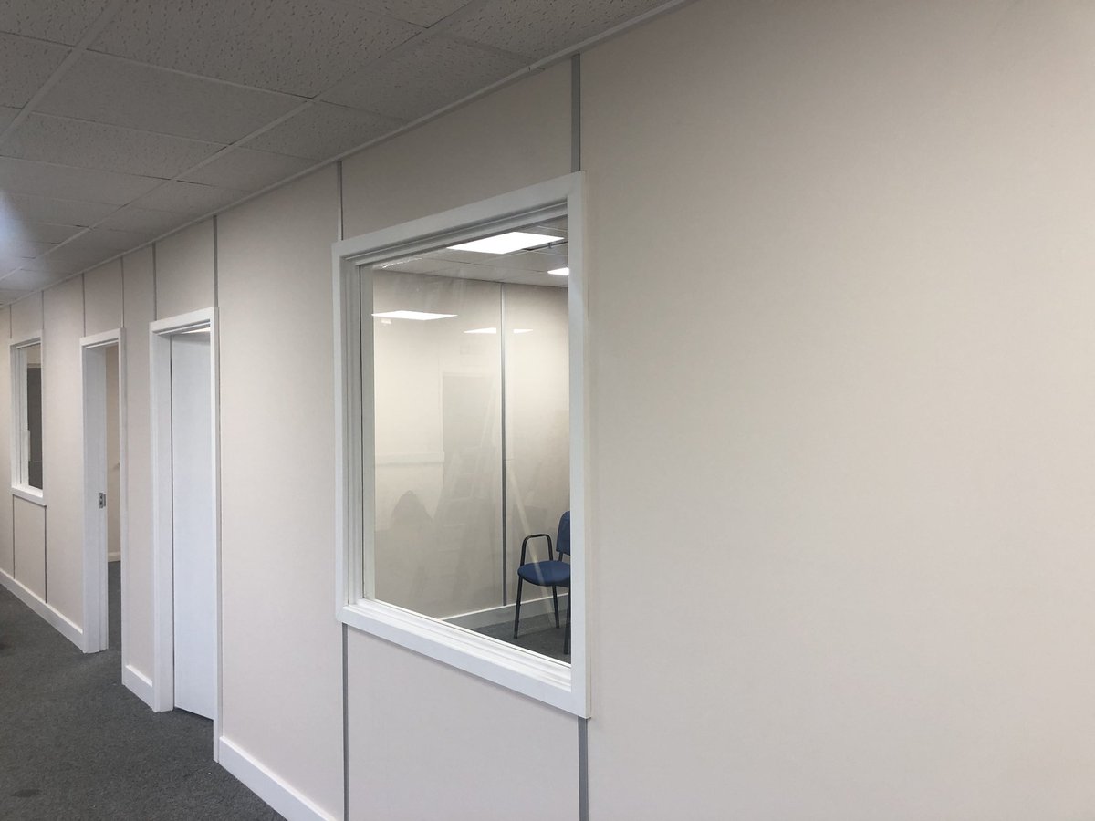 CountyCon's tweet photo. Office partition up this week with vinyl covering and eggshell woodwork https://t.co/6MJYRtosGq