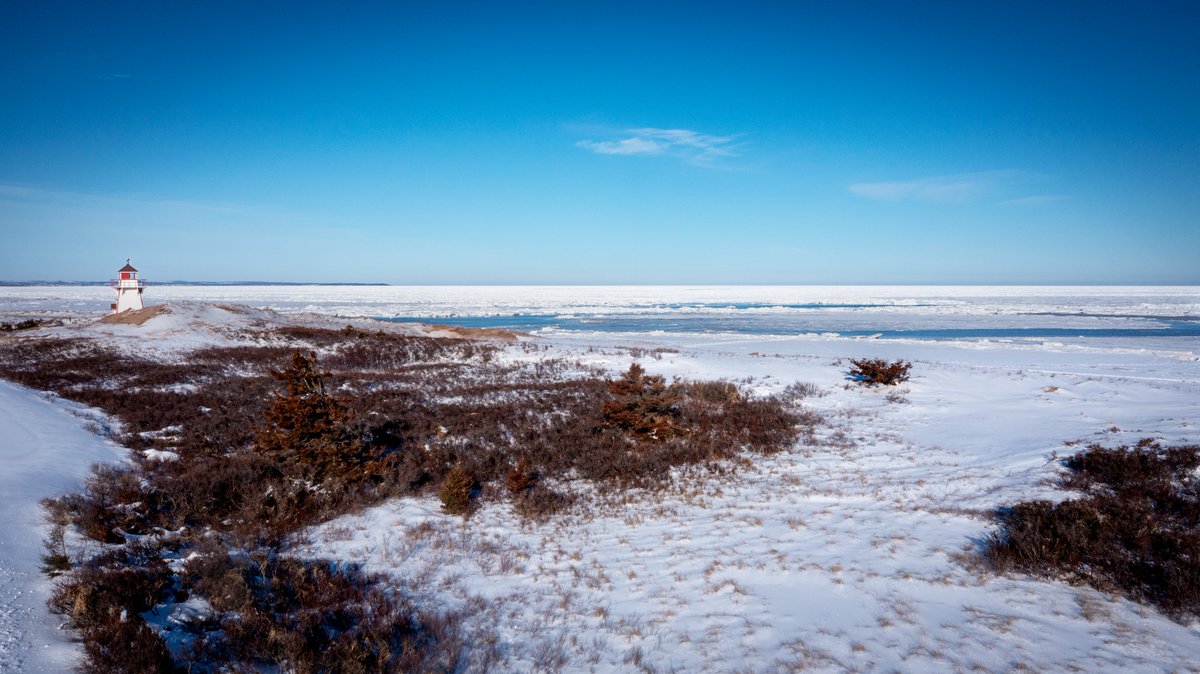 CBCshaner's tweet photo. No matter the time of year, Covehead Harbour and the Lighthouse are ready for a shoot. Had a great day with perfect Blue skies and almost no wind. It was nice to see Sea Ice, not sure if it is enough but good to see either way. #PEI @tourismpei @CBCPEI https://t.co/IJKzVes85C
