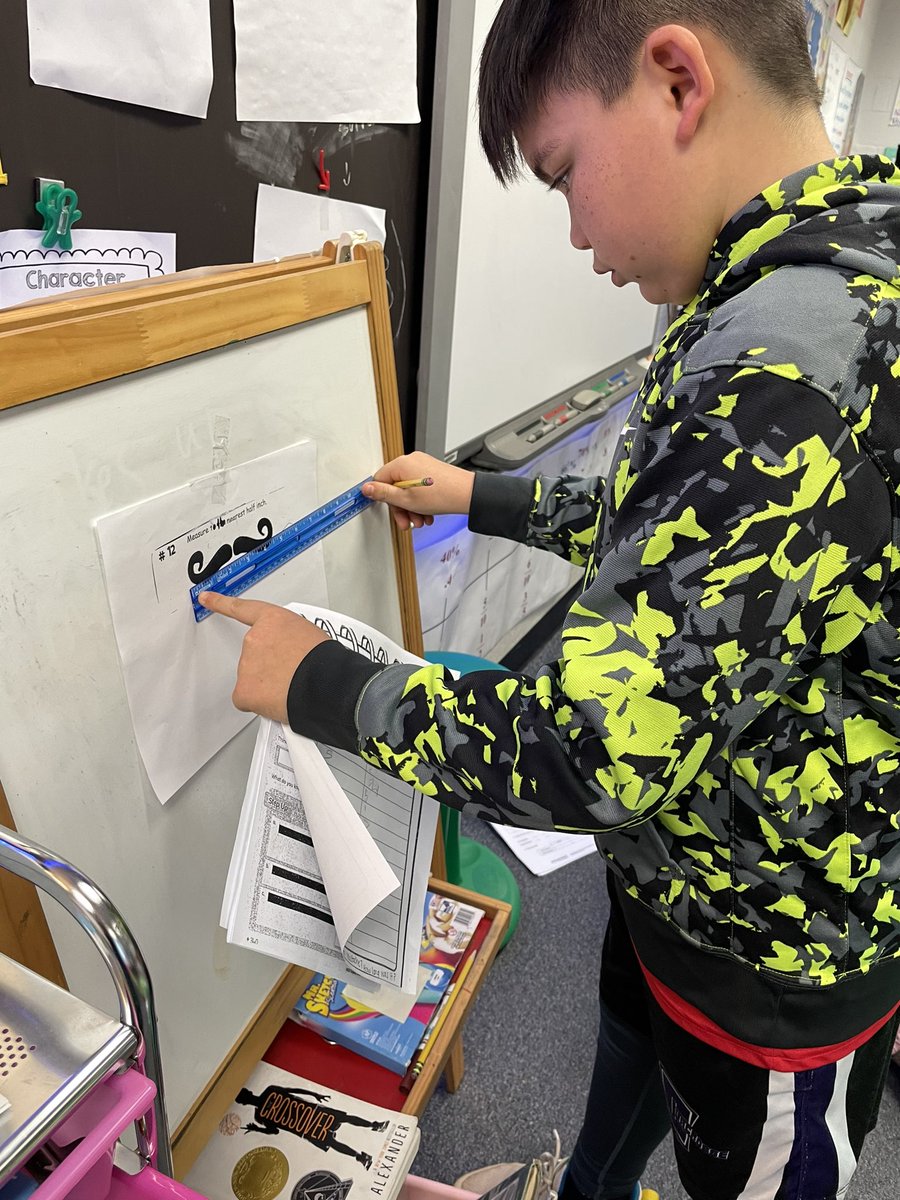 Practicing our measurement skills with jumping frogs and mustaches! Who said math can’t be fun?!