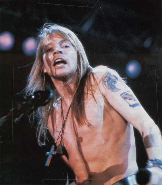 crockpics's tweet photo. Axl Rose on stage, early '90s. https://t.co/VHIRMFRePL