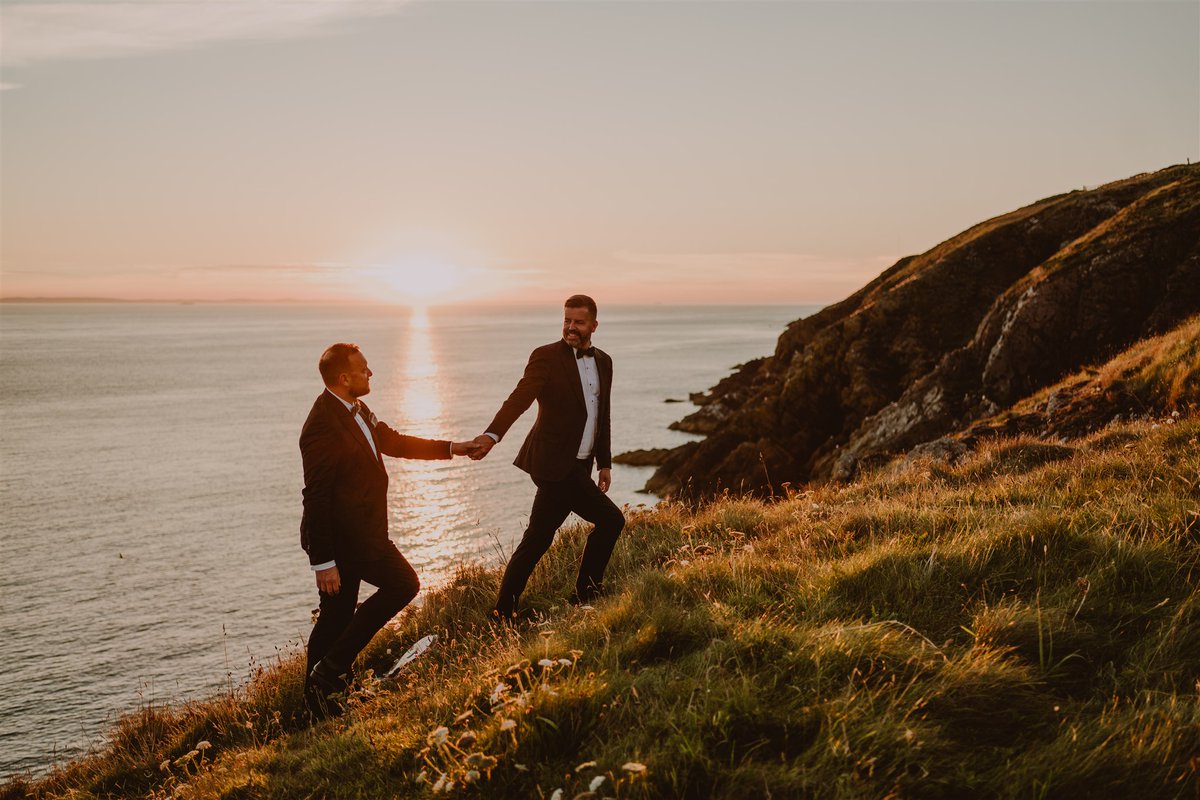 Todd and Chris, standing in gleaming meadows on the cliffs, behold a future as golden as these coastal sunsets.

#dunskeyestate #dunskeymagic #scottishwedding #weddinginscotland #scottishweddingvenue