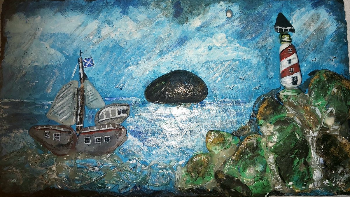 Justin Harrison and Michelle  Harrison Art work. It is pebbles and sea glass from the beech . It is on slate with  Acrylic paint.  We bib it together.