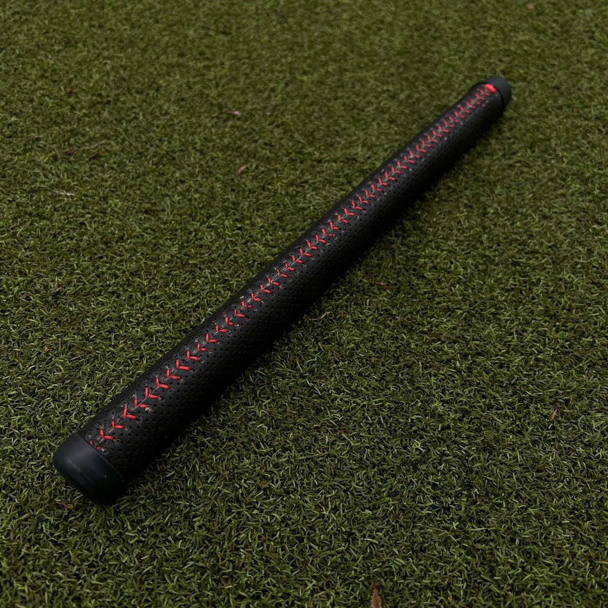 Black MicroPerf Leather Putter Grip + red baseball stitch. #golf #LeatherGolf #CustomGolf #PutterGrip