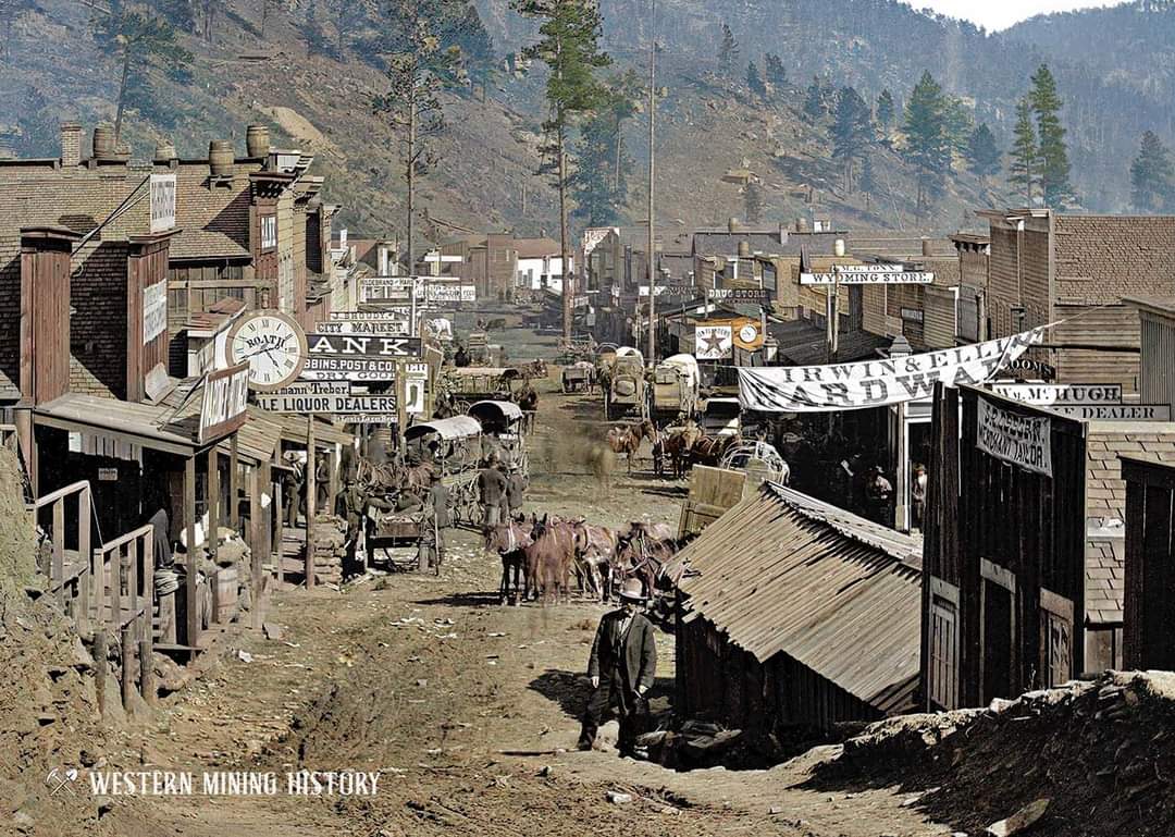 Trad_West_Art's tweet photo. Colorized photo of Main Street - Deadwood, Dakota Territory 1877. https://t.co/KKCJ4i1tL6