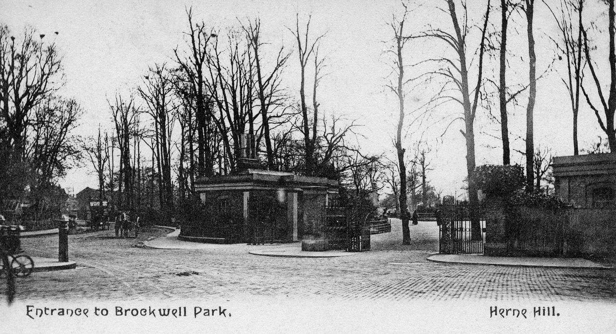 #HerneHill postcard from c1900 pre-trams and significant motor traffic. The lodge-houses at the gates predate #BrockwellPark becoming a public park in 1892. Shops on Norwood Road only arrive in the 1920s. Rookeries in the elm trees were famed, though declining by this date.