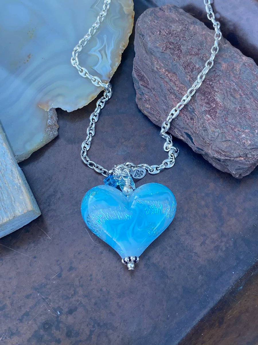 StudioBBdesigns's tweet photo. Shine bright like a diamond with this dazzling dichroic glass heart ✨💎💙

Shop Now: https://t.co/Etvm9xaBVA

#shinebright #glassheart #heartofglass #blueheart #handmadejewelry #glasshearts #lampworkglassheart #glassjewelry #glasshandmadeheart #studiobbdesigns https://t.co/eDK48A7pbr