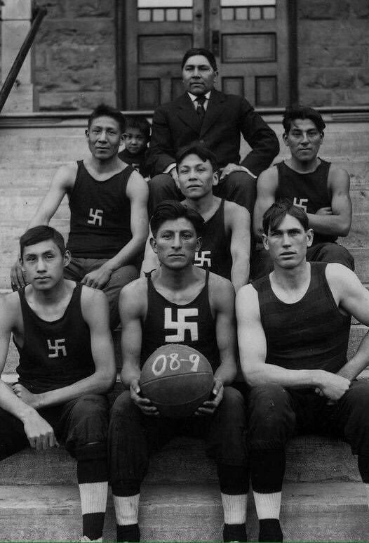 native_explore's tweet image. Chilocco Indian School Basketball team, 1908. To some Indigenous communities, the swastika was a symbol of peace, love and good luck. Before it was appropriated by Nazi’s, white supremacists — and far right radical extremists.