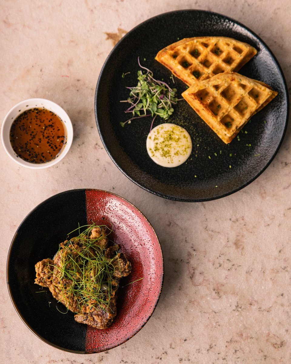 princewaikiki's tweet photo. Cheddar and chives waffle with kaarage chicken and a drizzle of black pepper maple syrup. Your search for the perfect chicken and waffles is over. Join us at 100 Sails.

Lunch 
Monday - Saturday (11:00AM - 1:30PM) 

#100sails #princewaikiki #chickenandwaffles #hawaiidining https://t.co/lIExgSnDsi
