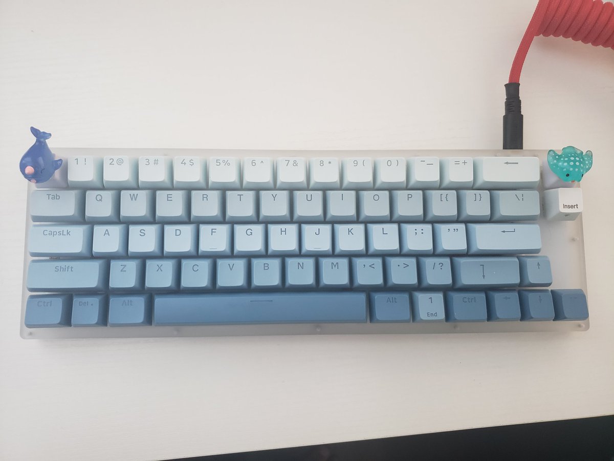 SulleN_val's tweet photo. I wanted to build a Water/Ocean themed board and here's how it turned out. I really love the look. Board is a Womier K66 with Gateron Milky Yellow switches and a narwhal and manta ray keycap to accent. One more keycap is still on the way, but I love how this guy turned out. https://t.co/IKgd2zyLdn