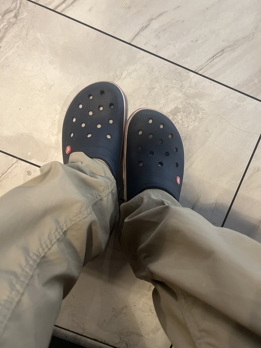 MrBeachTeam's tweet photo. At the airport and my lady just told me she forgot my shoes for this work conference. @kwfamilyreunion 

This is what I’ll be wearing all week. I will live tweet these events as I’m sure I’ll be the only one in #Crocs https://t.co/s8sDAeZBSF