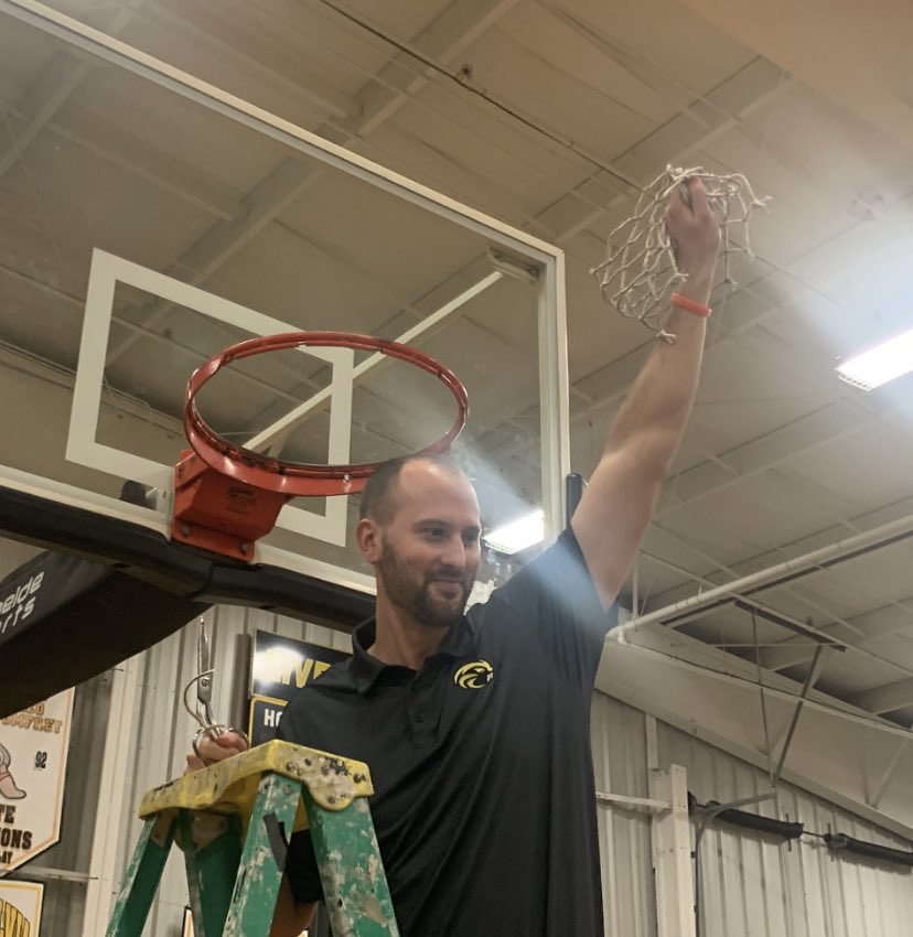 Coach Matt Grendel of <a href="/rhsbeavers/">Riverside Beavers</a> celebrates a net cutting.