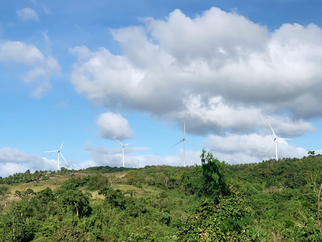ADBChiefEcon's tweet photo. It was great visiting this wind farm in Rizal 🇵🇭 and see the 27 wind turbines.

Wind accounts for a small share of electricity in the #PH but will increase under the government's climate action plan.

Looking forward to seeing and supporting more renewable energy projects! https://t.co/bOrjvhFKwU