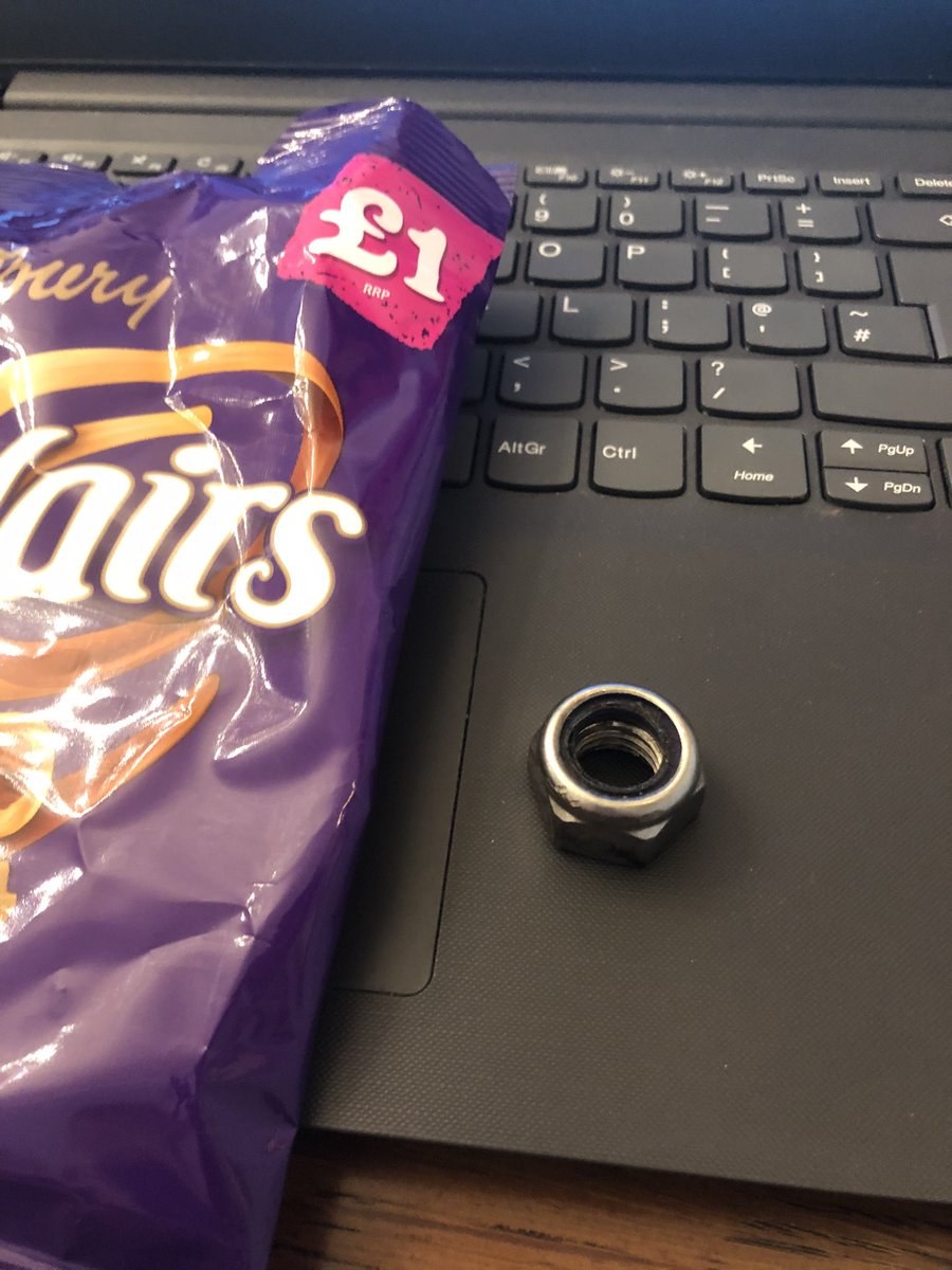 Amy_G777's tweet photo. @CadburyUK slightly concerned that one of your machines is about to fall over… found this nut in one of your eclair packets. Worrying? https://t.co/4vWyY3dqsl