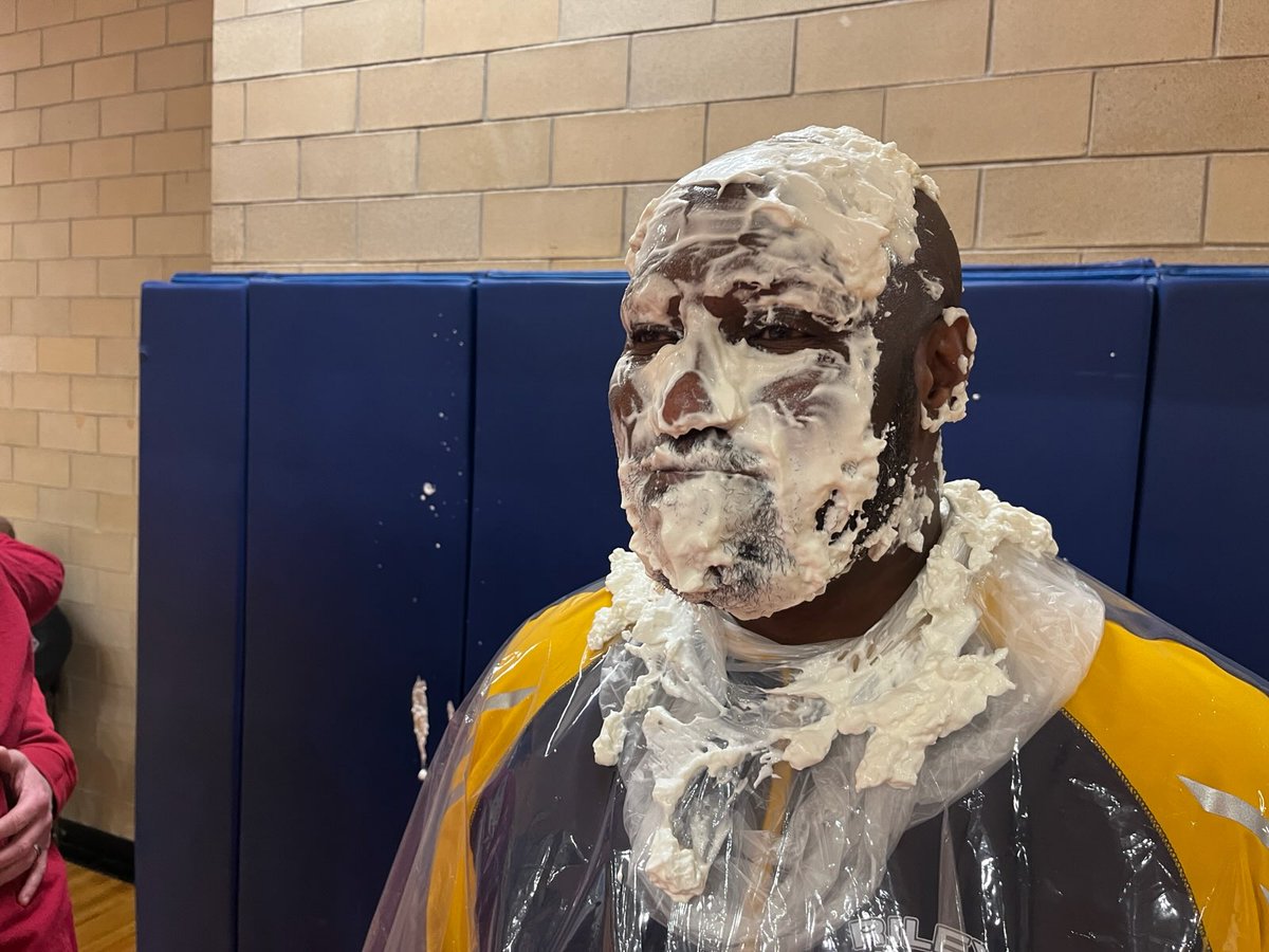 Great <a href="/RileyWildcatsBB/">Riley Wildcat BBall</a> win last night over Adams. But the highlight of the night was the collaboration between <a href="/SBJohnAdamsHigh/">John Adams HS</a> Isaac Shrader &amp; <a href="/SBRileyhigh/">South Bend Riley</a> Vanessa Plata on collecting long sleeve shirts for local farmers! Which resulted in Mr. Seitz &amp; I getting pied! #community