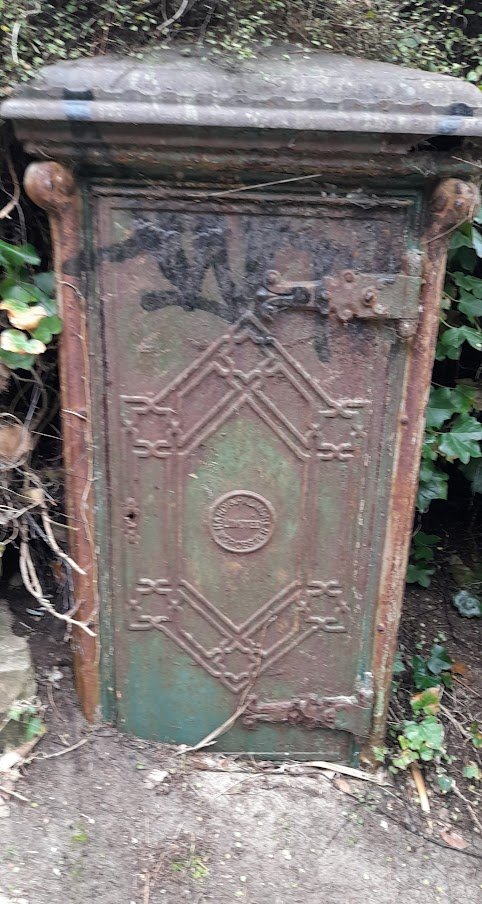 MsJEdwards1's tweet photo. Have never seen this before halfway up on the East Cliff zig zag..looks like a safe! Does anyone know what it is? Shame about the graffiti! https://t.co/BphI01xYMH