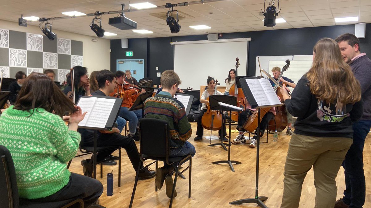 Action shot from the rehearsal on Wednesday of my Concerto For Flute & Chamber Orchestra. It’s sounding amazing already @RobGuyConductor / band / #charlotteballard doing a wonderful job. Curious to know what’s being discussed here? Come on the 25th Feb, 3:30pm!