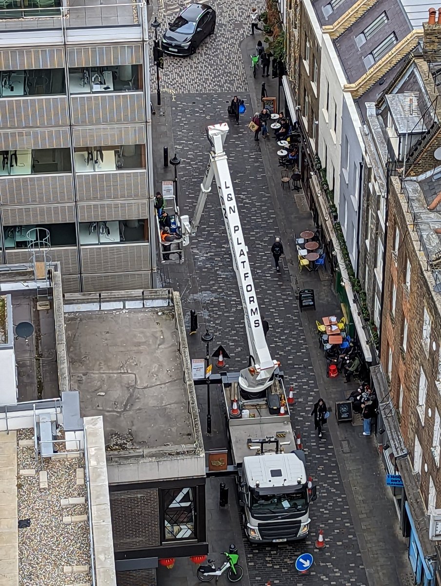 stateofsoho's tweet photo. The madness of cities. Why would you design/permit a building with so much glass which relies on a window cleaning method that impacts so much on the rest of the neighbourhood? Saturday morning, engine running for 3+ hours #BerwickSt #Soho https://t.co/rZZdATKbRg