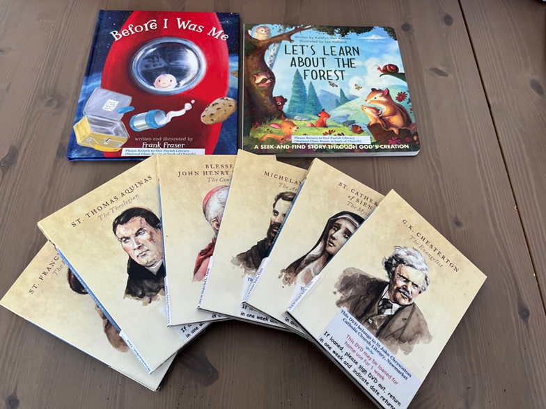 New Additions to St John’s Parish Library in Stained Glass Room

Books “Before I Was Me” and “Lets Learn About the Forest”, a Learn and Find book about God’s Creation donated by the St John’s CWL.