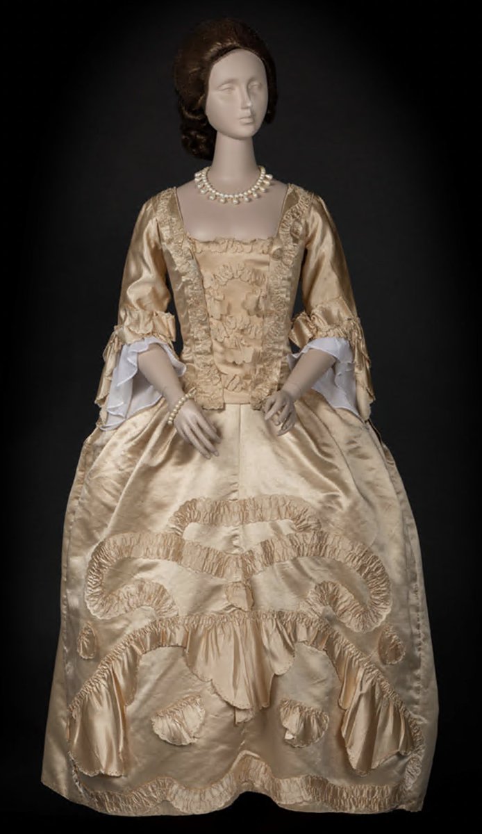 Pretty mid 18th century round gown purchased by Mary Doering in honor of her Mother from Cora Ginsburg in 1978.  Gown was said to have been worn in a wedding in the West of England.  This will be going on view in July here at Colonial Williamsburg