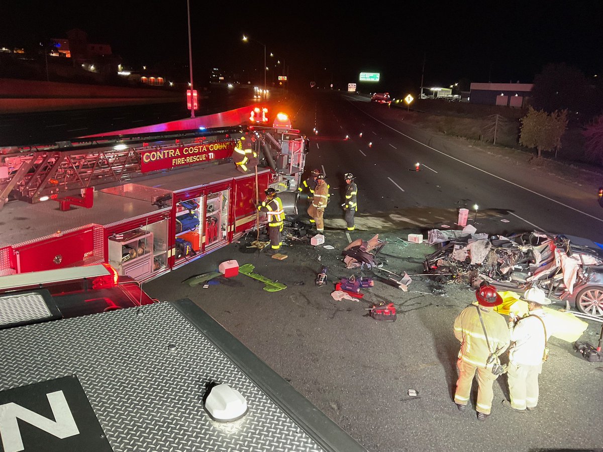 ContraCostaFire's tweet photo. Slow down and move over when approaching emergency vehicles. Truck 1 was struck by a Tesla while blocking I-680 lanes from a previous accident. Driver pronounced dead on-scene; passenger was extricated &amp; transported to hospital. Four firefighters also transported for evaluation. https://t.co/YCGn8We1bK