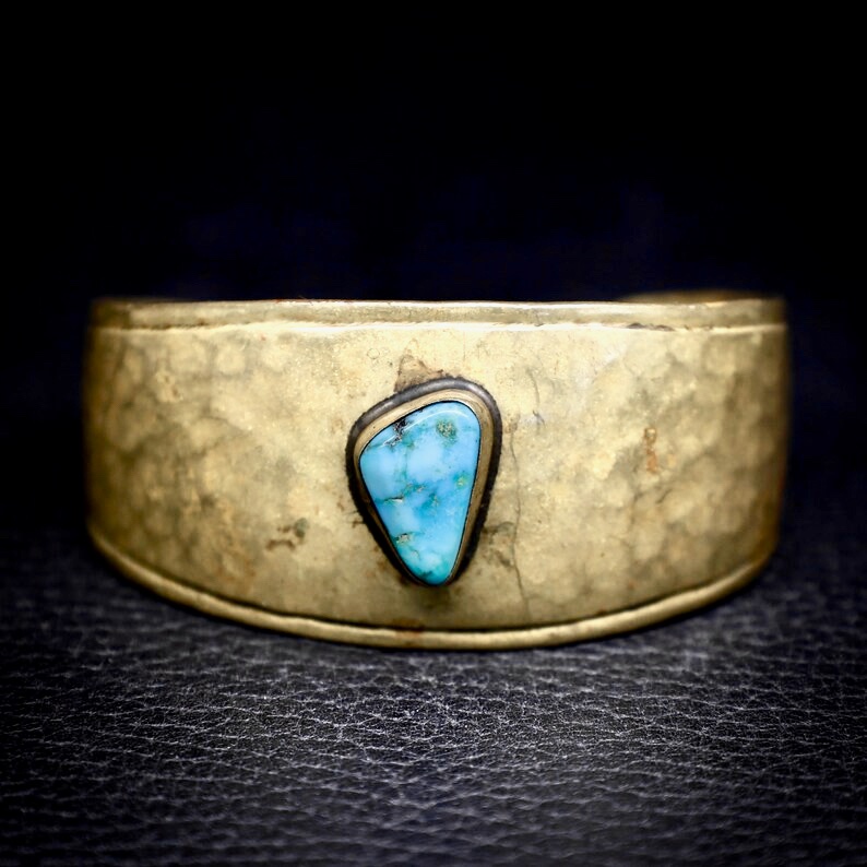 Vintage Bohemian Turquoise and Hammered Brass Cuff Bracelet- Signed 

Available at Far-Rider-West.com

etsy.me/3IAc4oc #southwestern #unisexadults #turquoisebracelet #vintagejewelry #uniquegifts #mensbracelet #turquoise #bohemian #brassbracelet #uniquegifts #gift