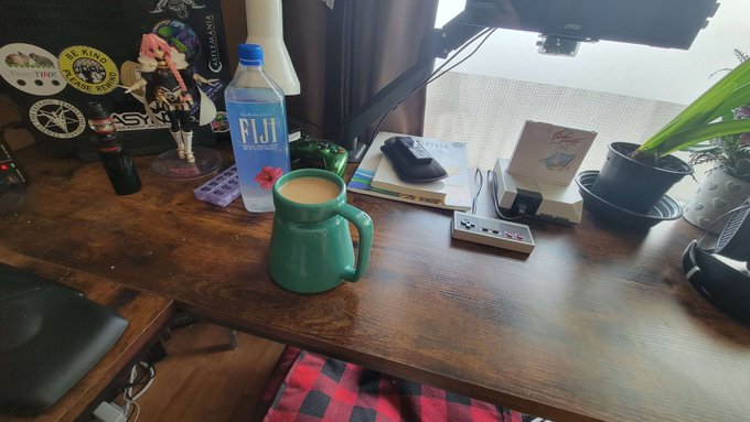 We're gonna try something a little different this morning.  Ashtray next to smoking hand, coffee far