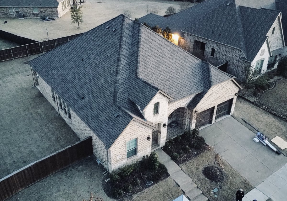 TexasLegacyGC's tweet photo. Just enough daylight to grab a coulple final drone photos. Stunning finish in GAF - Roofing Timberline HDZ in Weathered Wood. Another happy client. #Roofing #GAF #SuperiorResults #TexasLegacy https://t.co/uyqEXpwLtq