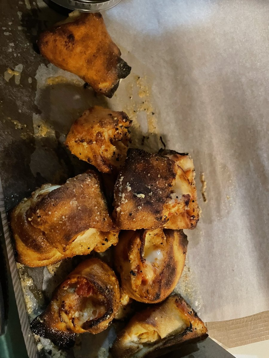 DisneyMama425's tweet photo. @PapaJohns pizza bite things are burned 🤮 and drowning in grease but at least the driver told me #HappyNewYear!!! 😆 https://t.co/trlFfv8VCp