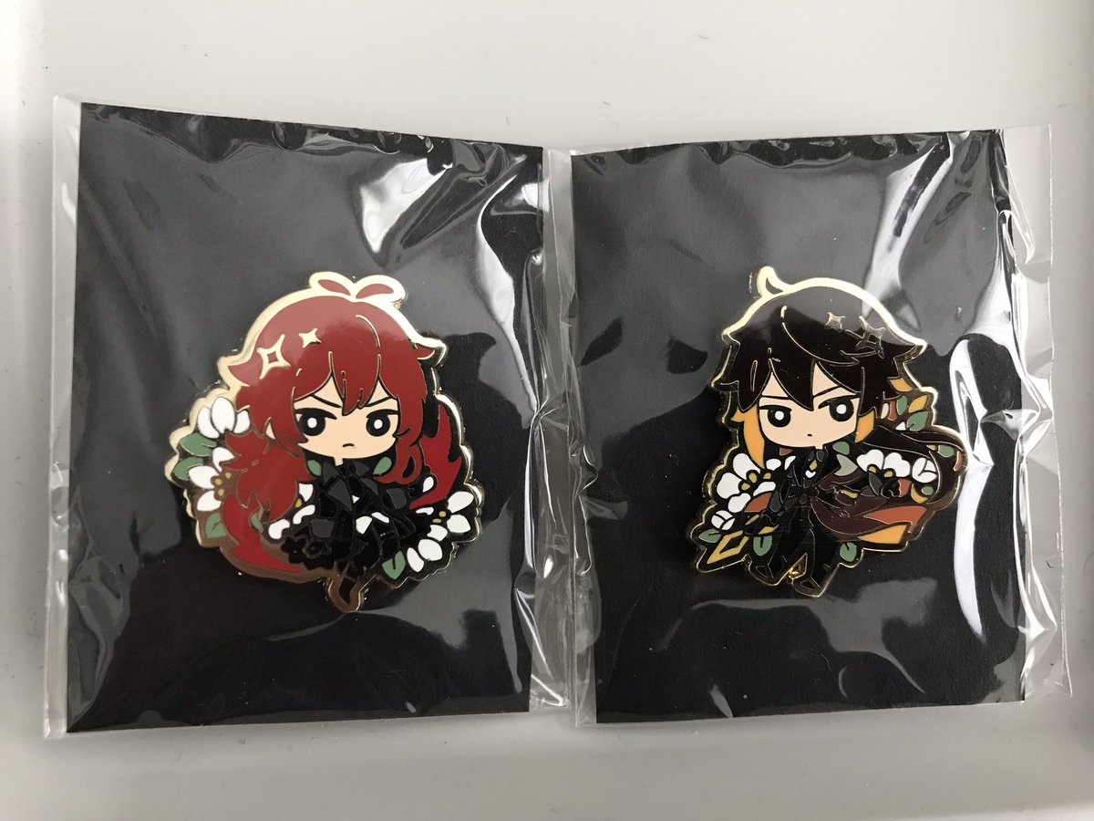 gentsofteyvat's tweet image. Unfortunately we have run out of custom backing cards, so some of the A-grade enamel pins will have a black backing card. Other grades will have a brown backing card :)
