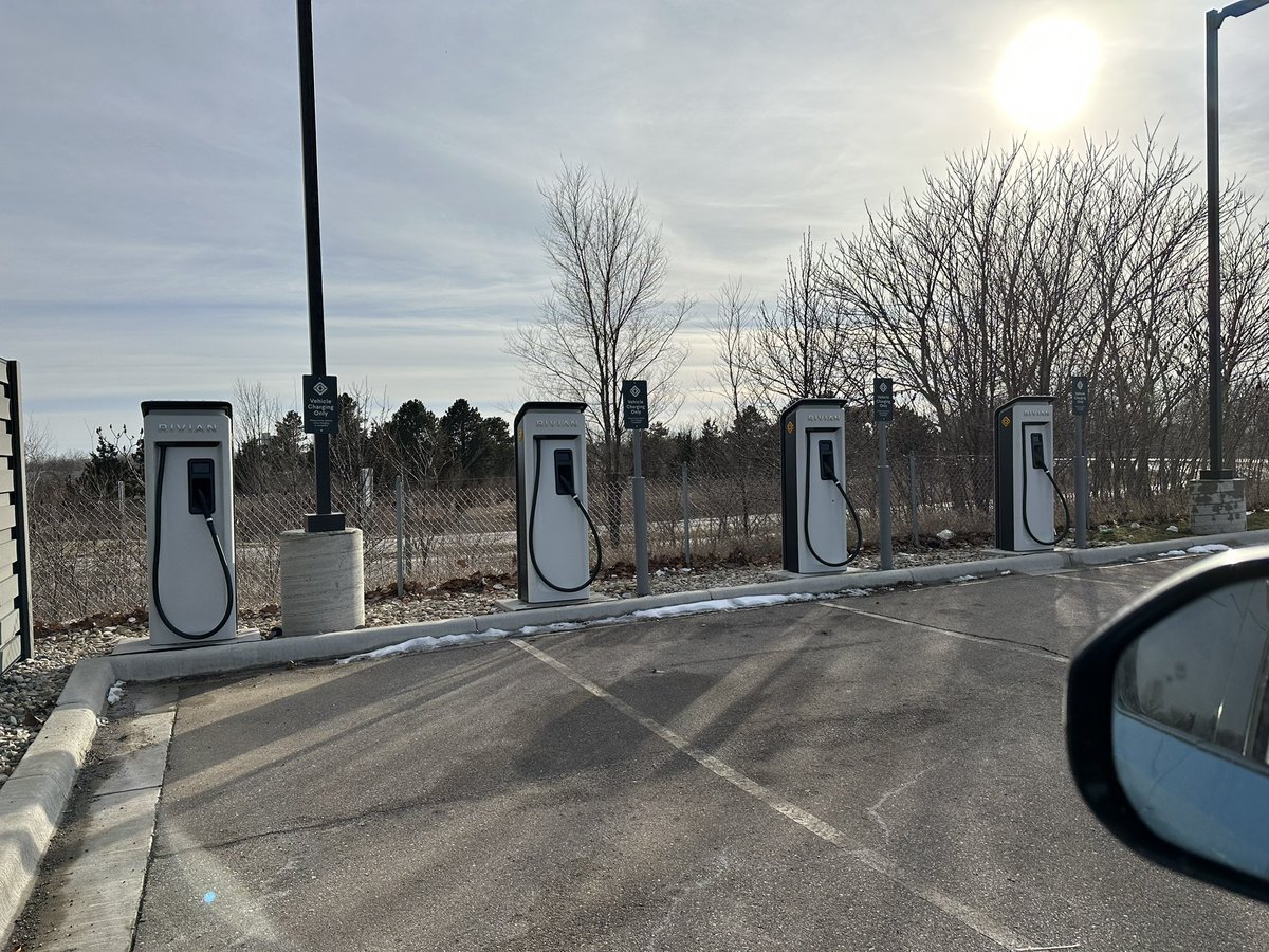 marusin's tweet photo. The @rivian Adventure Network looks ready to go in Benton Harbor, MI. 6 stalls with the ability to pull a trailer through on 2 chargers (not shown). FYI @RANtracker https://t.co/nsipXmjy8A
